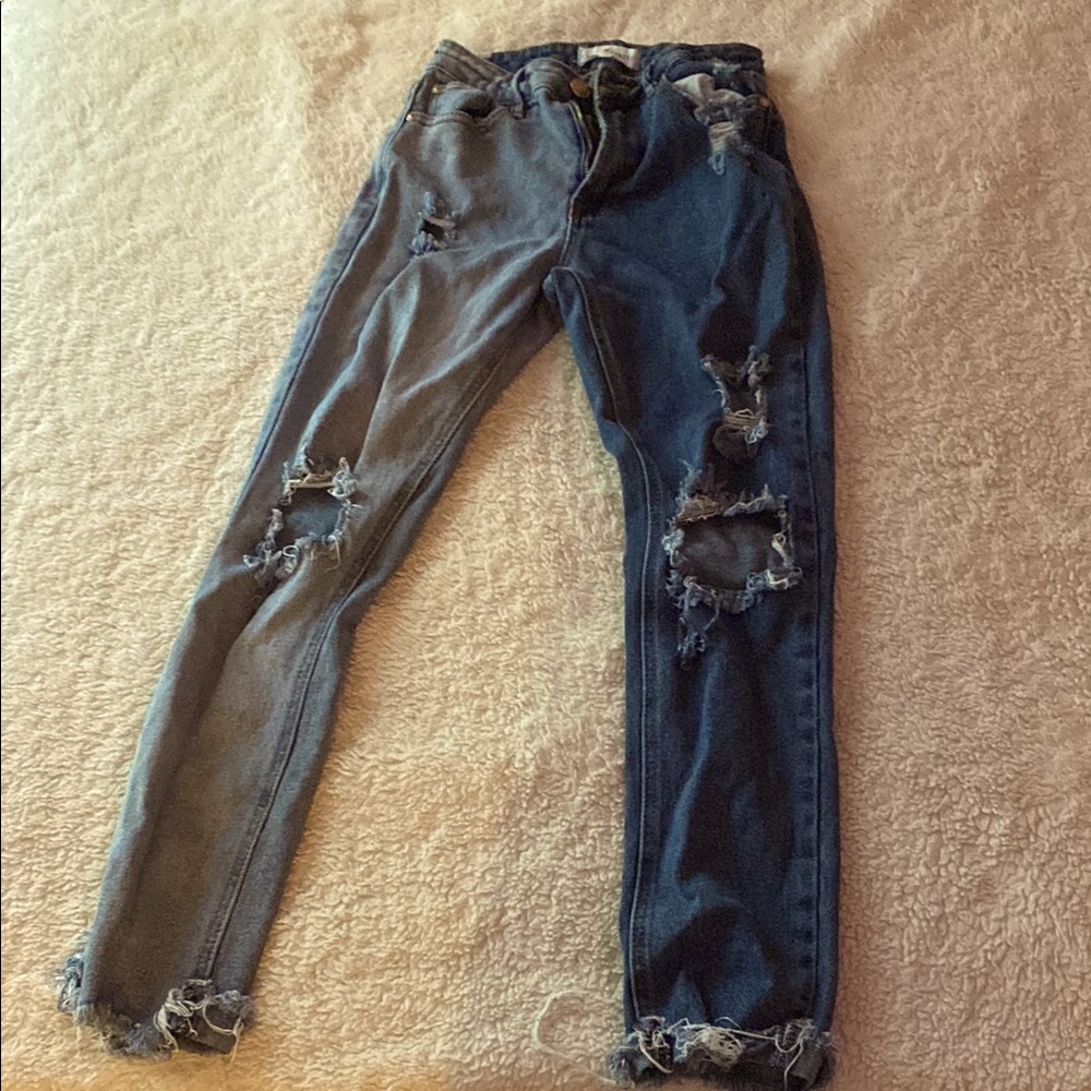 Distressed Blue Jeans